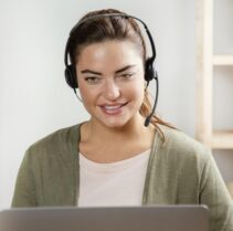woman-with-headset-using-laptop (1)